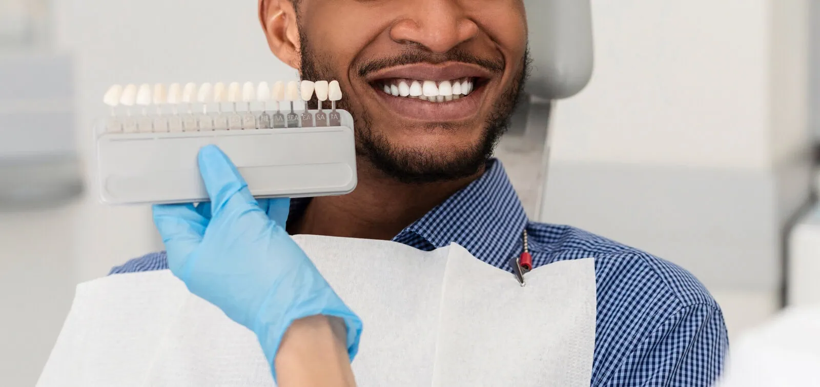 Happy patient with a bright, healthy smile at Glassell Dental